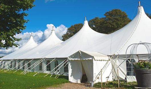 a line of sleek and modern portable restrooms ready for use at an upscale corporate event in Notus